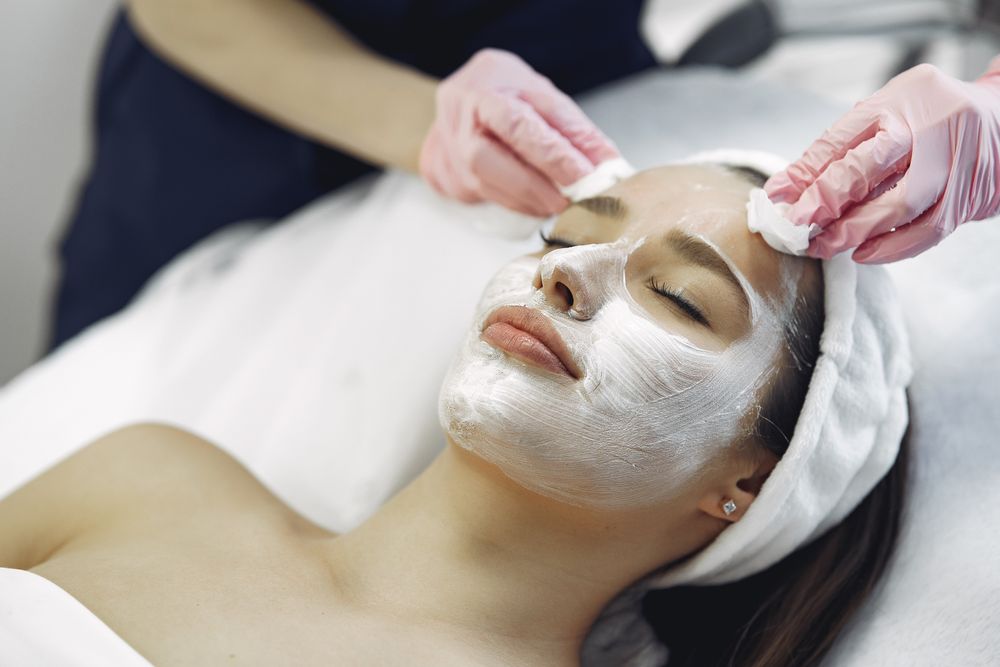 Application of a facial mask, stock photograph